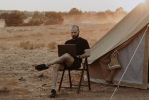 A man surfing the internet outside